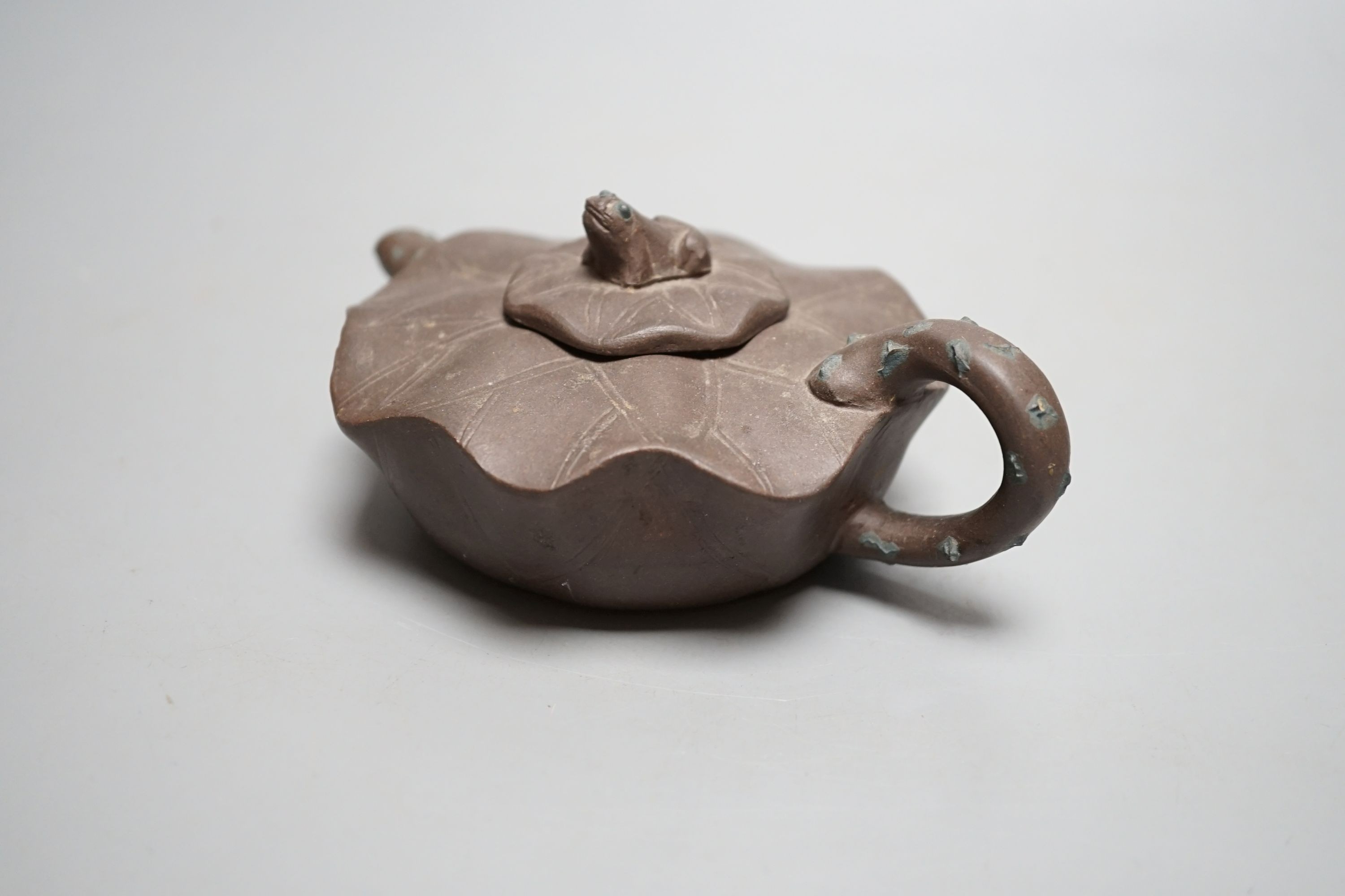 A Yixing clay teapot.